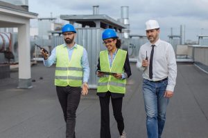 The contractor and project manager check on the construction project progress on-site